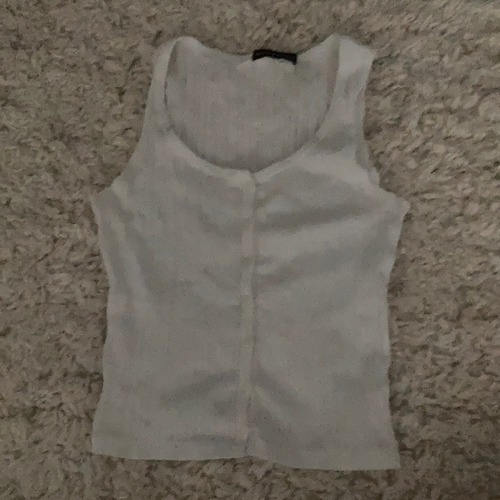 Brandy Melville women’s white button tank.
